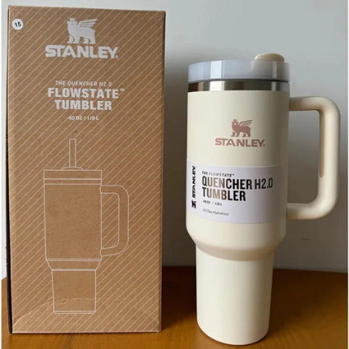Stanley tumbler with handle next to its packaging